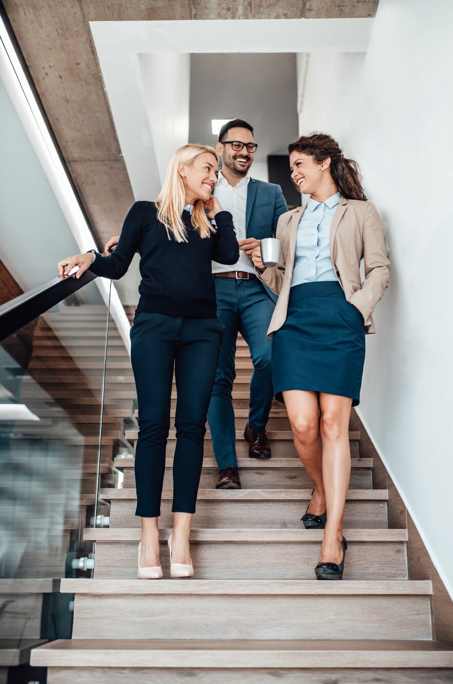 a group of people walking down a staircase